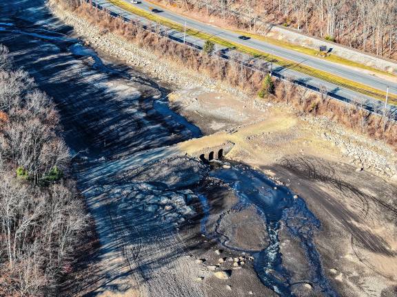 <b>A bridge usually covered by water is visible in the Charlotteburg Reservoir in Jefferson on Nov. 18. At right is Route 23. (Photo by Nick Horton, www.thepathfinderstudios.com)</b>