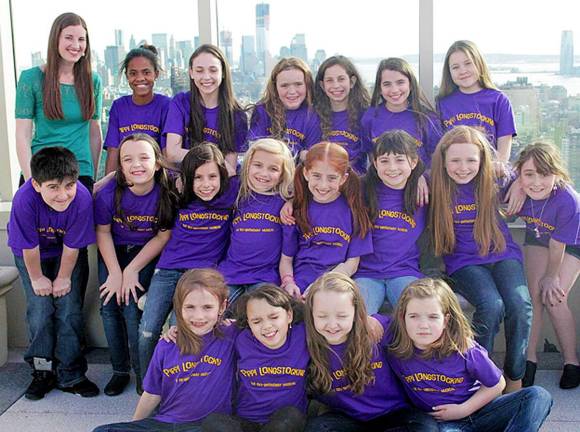 West Milford girls Grace Nevin and Emmy Glick, back row, third and fourth child from left, are cast members of the Off-Broadway production of Pippi Longstocking,