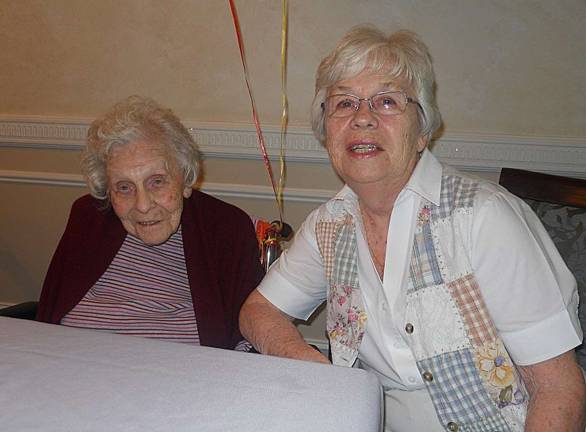 Helen Ross, left, is seen with her daughter Edna Rothe as they celebrated Ross's 104th birthday on Aug. 14. Ross is a resident of Milford Manor.