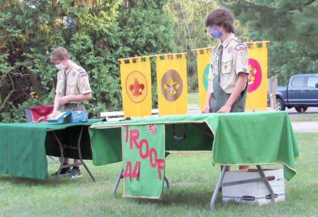 Sean McNally, Senior Patrol Leader, and Shawn Moore, Assistant Senior Patrol Leader, at the Court of Honor for Troop 44, was held outdoors beside the West Milford Presbyterian Church's Fellowship Hall in July.