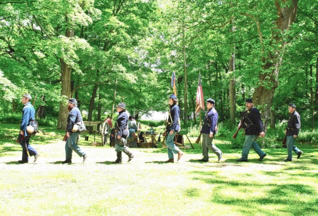 Led by Cpt. Nathan Bedford and Sgt. Kristopher Brembt, the 6th New Hampshire Volunteers march on reconnaissanace.