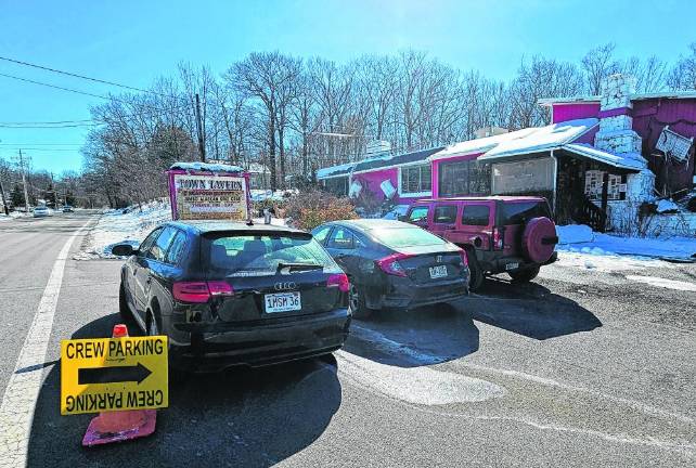 MV1 The parking lot at Town Tavern on Macopin Road is full of trucks and cars serving a crew making a movie on Weaver Road on Tuesday, Feb. 20. (Photos by Rich Adamonis)