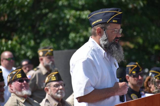 WMP10 American Legion Post 289 Commander Dave Crum speaks at the ceremony.