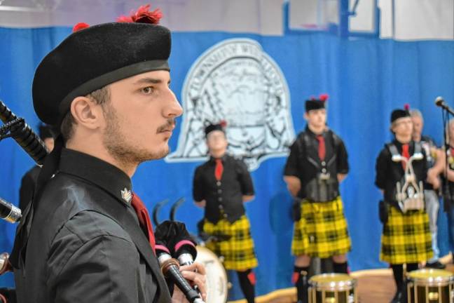 West Milford High School band member Jess Pritchett and other bagpipers performed during the ceremony.