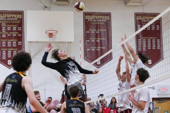 Andre Christ of West Milford prepares for a kill attempt during game two against Summit.