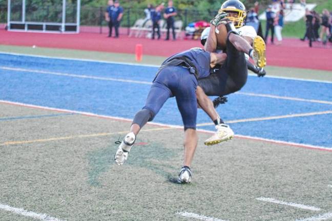 <b>WJ2 West Milford wide receiver Marcus Morgan catches a long-range pass in the first half. He landed just short of the goal line.</b>