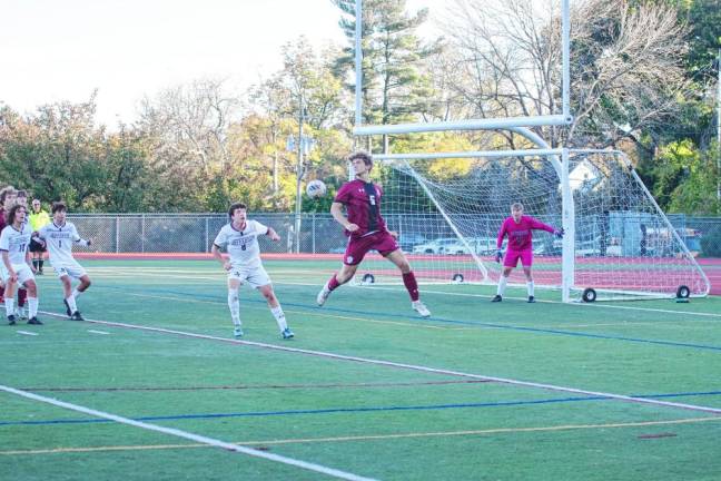 FL1 The soccer ball and a Newton Brave go airborne in the first period of the game against Jefferson at home Thursday, Oct. 17. The Falcons won, 1-0. (Photos by George Leroy Hunter)