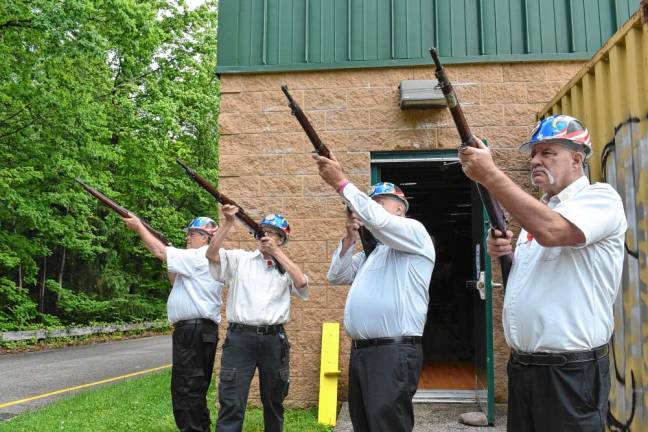 A traditional gun salute was part of the Memorial Day ceremonies.