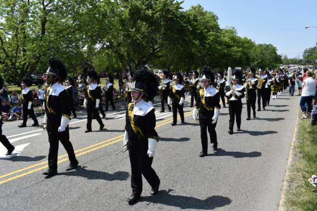 The West Milford High School Highlander Band marches in the parade.