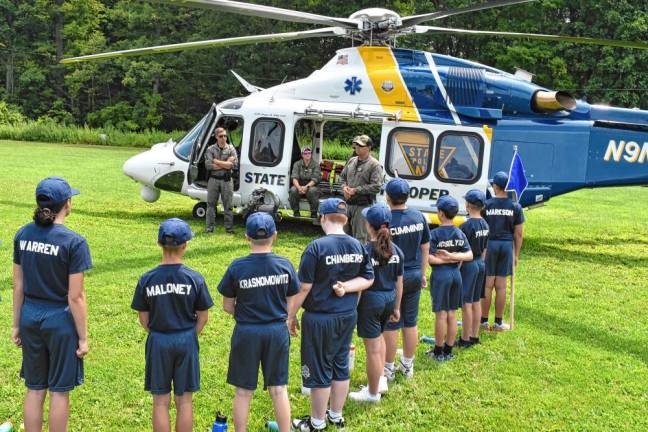 State Police Trooper and helicopter pilot Matt Sullivan briefs cadets on airborne policing and answers questions. (Photo by Rich Adamonis)