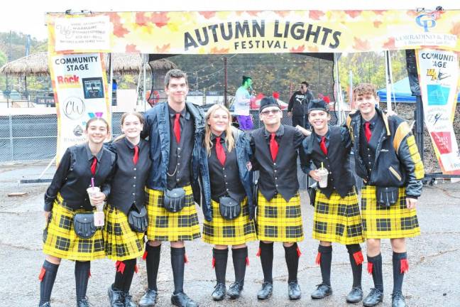 Members of the Pipes &amp; Drums of the West Milford Highlander Band pose. (Photo by Maria Kovic)