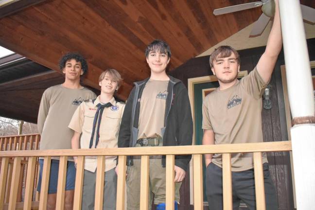 Boy Scout Troop 159 members, from left, Joah Diodonet, Griffin Kleinfelder, Steven Igielski and Dylan Becker volunteer with Jill’s House. (Photo by Rich Adamonis)