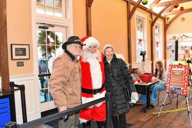 <b>OT5 Bill and Pat Dermody of Sparta pose with Santa. (Photo by Maria Kovic)</b>