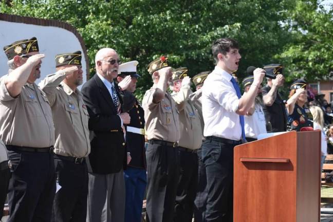 WMP8 Veterans salute as Jason Pritchett sings the National Anthem.