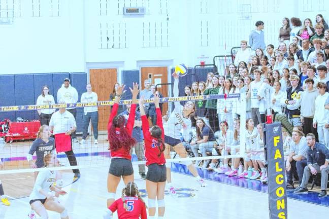 FV3 Jefferson's Carsyn Giessuebel leaps and strikes the ball. She made nine kills, five digs and two aces.