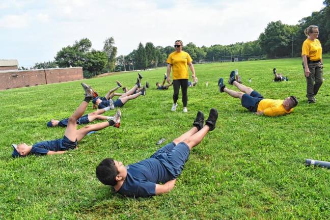 Cadets start each day with a rigorous exercise session.