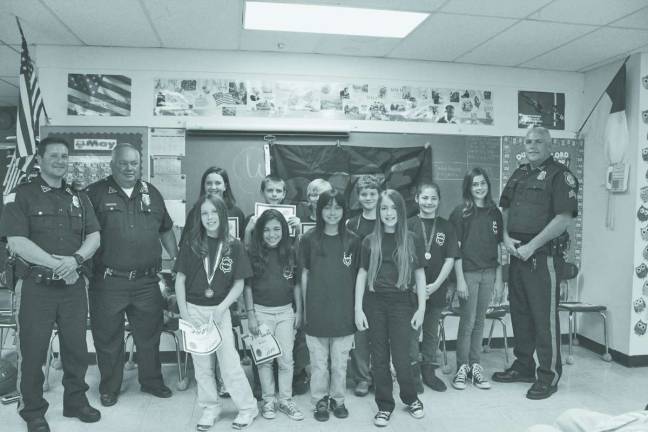 The fifth grade DARE graduating class at Ringwood Christian School learned how to fight negative peer pressure.