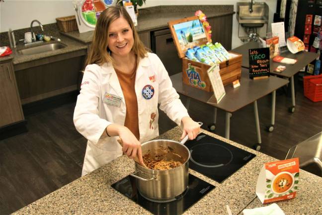 Charles Kim photo ShopRite Registered Dietician Megan Scutti makes a one-pot pasta for people to sample at the Marshall Hill Road store in West Milford on Wednesday.