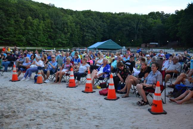 The large crowd packed the beach at Bubbling Springs to hear the Jimmy Buffett tribute band.