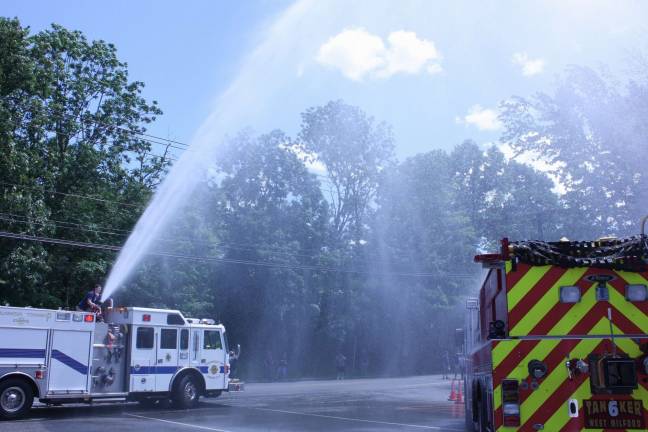 Pequannock Fire Co. #2 spouts an aerial christening. Photo by Ginny Raue