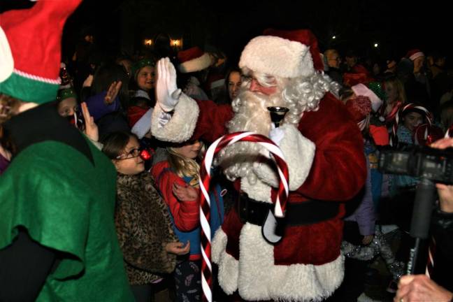 Santa Claus greets the children during Monday night's tree lighting.