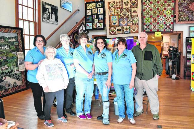 From left are members of the West Milford Heritage Quilters: Karry Gonyou of West Milford, Shirley Ruggiero of Hewitt, Meg Woznicki of Oak Ridge, Linda Pierson of Franklin, Iman Mak Dey of Ringwood, Debbie Van Brunt of West Milford and Kerry O’Brien of Hewitt.