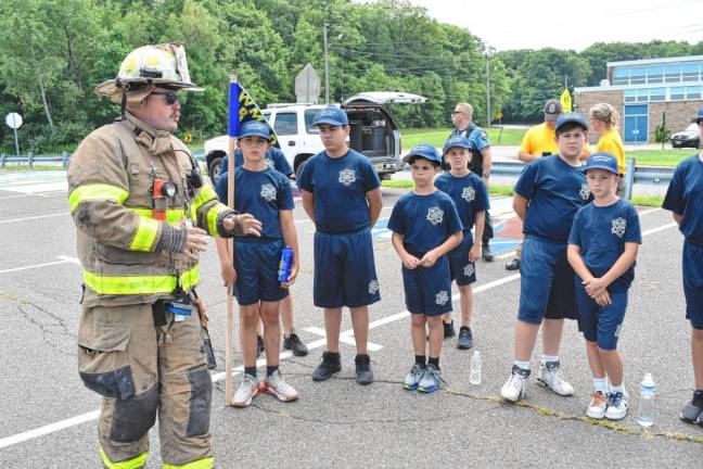 Cadets receive a briefing by Fire Department Company #3 Chief Keith Weber. Company members also demonstrated a vehicle rescue. (Photos by Rich Adamonis)