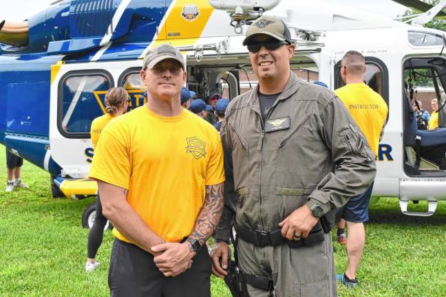 Detective Nik Snook, left, with State Police Trooper Matt Sullivan.