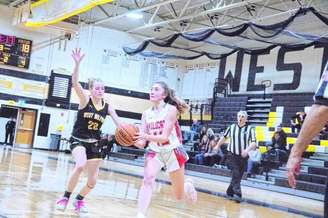 <b>High Point’s Kennedy Shepherd moves the ball in the game against West Milford on Thursday, Feb. 27. The Highlanders won, 42-28, in the first round of the NJSIAA North Jersey, Section 1, Group 2 tournament. </b>