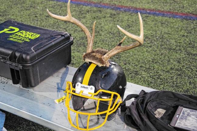 A West Milford Highlander helmet is outfitted with antlers.