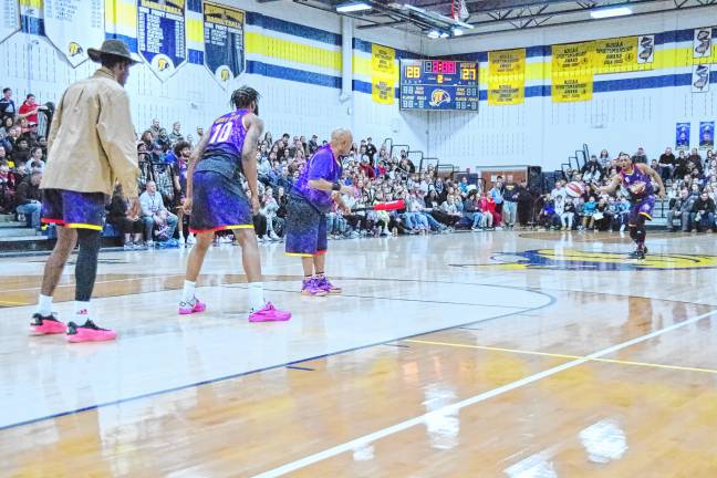 Somehow the Harlem Wizards managed to turn the basketball game into a baseball game for a few minutes.