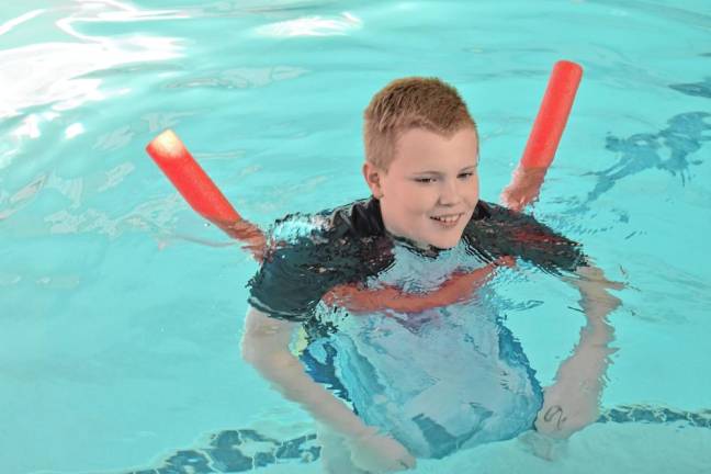 A camper in the indoor pool. (Photo by Rich Adamonis)