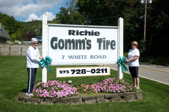 Cookie Gomm, left, and Jennifer Bishop of West Milford at painting the township teal in an effort to raise awareness of ovarian cancer. September is National Ovarian Awareness Month.