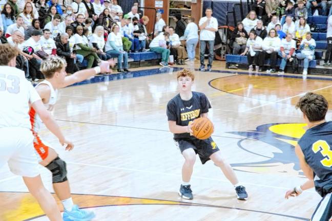 Jefferson's Eric Hokenberg handles the ball in the first half.