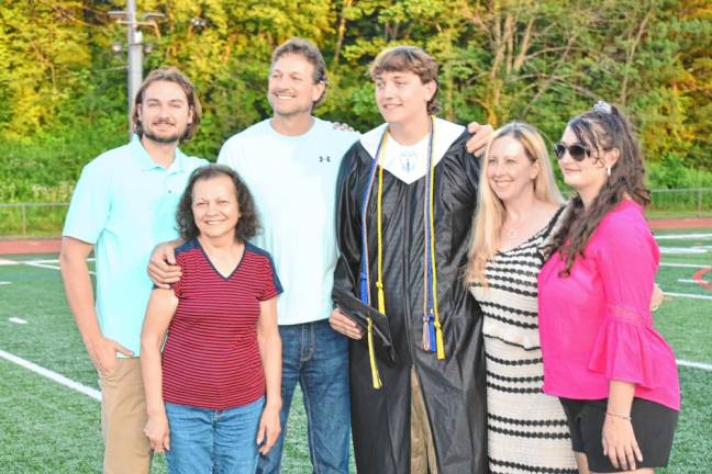Connor Vogt’s family celebrates his graduation. From left are Billy, his grandmother Annette, his father Bill, Connor, his mother Laura and Angela.