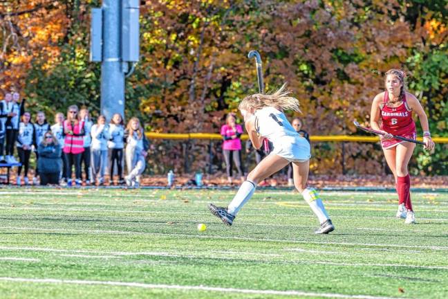 Vivian Sirnik of West Milford winds up for a strong drive toward the Pompton Lakes goal late in the game.