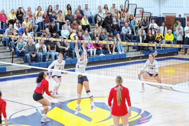 FV2 Jefferson's Lily Sonnenberg (3) strikes the ball above the net.