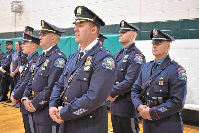 West Milford Police Chief Shannon Sommerville, center, stands with police officers during the ceremony. To his left is Capt. Anthony Parrello, whose brother, Brian, was killed in Operation Iraqi Freedom.