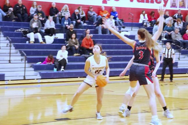 Jefferson's Emma Barone looks up during a shot attempt in the second half of the game against Lenape Valley on Jan. 24. Barone scored 15 points, and the Falcons won, 52-35. (Photos by George Leroy Hunter)