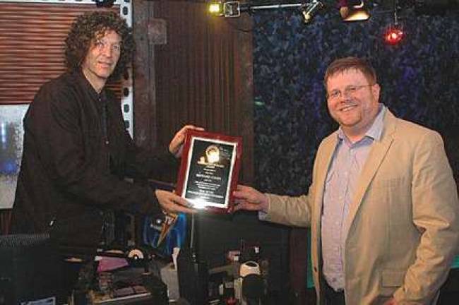 Rob Quicke of Hewitt, founder of College Radio Day, presented the Bravery In Radio Award to Howard Stern last year.