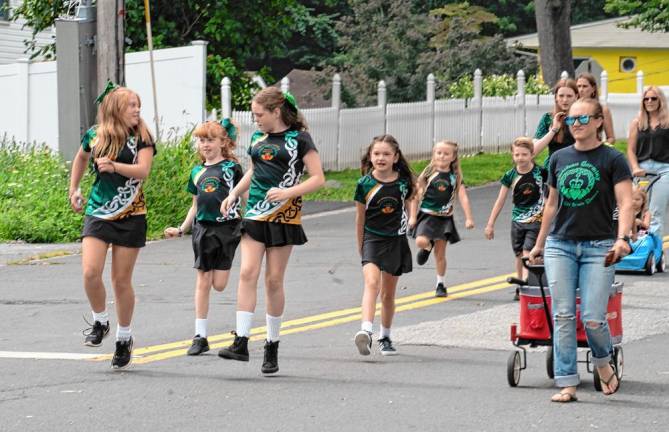 Irish step dancers march in the parade.