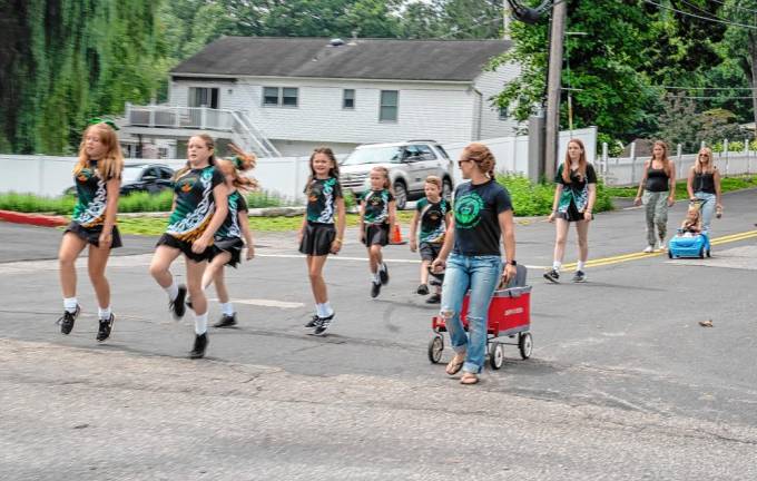 Irish step dancers march in the parade.