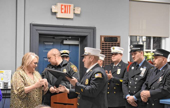 Mayor Michele Dale honors West Milford’s firefighters and other first-responders for their work during the wildfires.