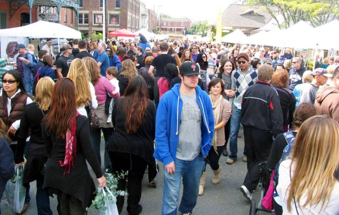 File photo by Rger Gavan Applefest has become one of the top fall events in the northeast attracting large crowds to the village of Warwick. This photo from last year's festival shows Railroad Avenue looking toward Oakland Avenue and Main Street.