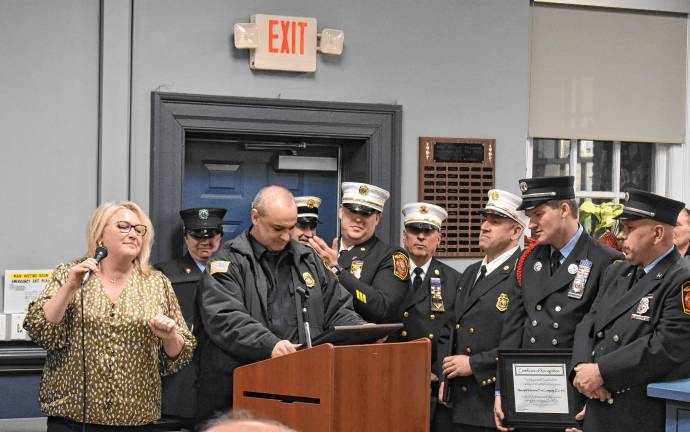 Mayor Michele Dale honors West Milford’s firefighters and other first-responders for their work during the wildfires.