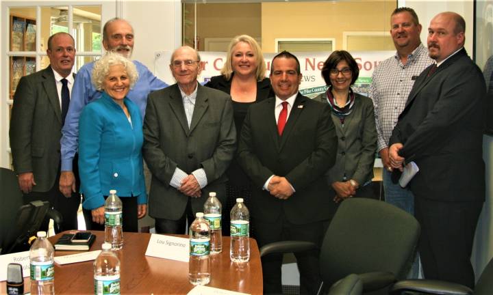 Left to right; Messenger Editor Charles Kim, Warren Gross, Publisher Jeanne Straus, Robert Nicholson, Mayor Michele Dale, Township Councilman, and mayoral candidate Lou Signorino, Managing Editor Pam Chergotis, Councilman Peter McGuinness, and Kevin Goodsir. Missing, Steven Castronova.