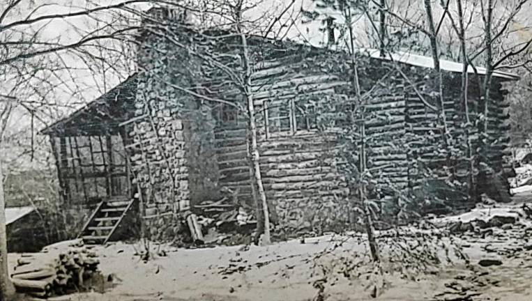 One of the original log cabins at Mountain Springs.