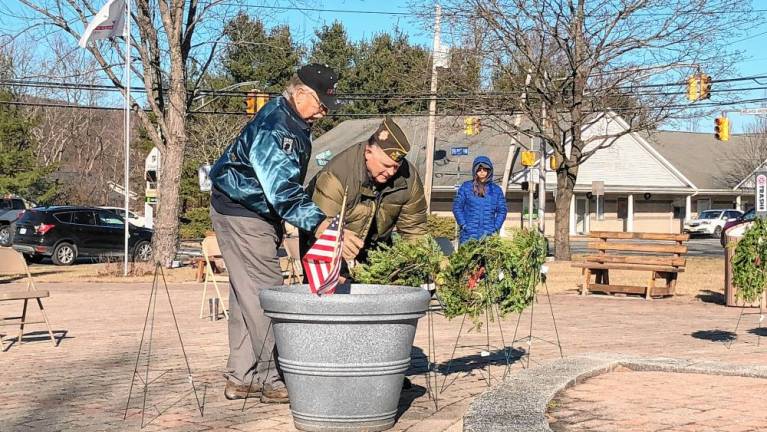 Veterans place wreaths in honor of each U.S. military branch during the ceremony.