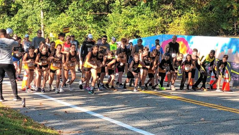 Runners begin the Highlander Education Foundation 5K on Sunday, Sept. 22 in front of West Milford High School. (Photos by Kathy Shwiff)