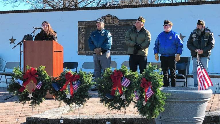 Cindy LeMay speaks during the ceremony. Her son Evan and his best friend Matthew Hoffman started the tradition in 2017 when they were in high school.